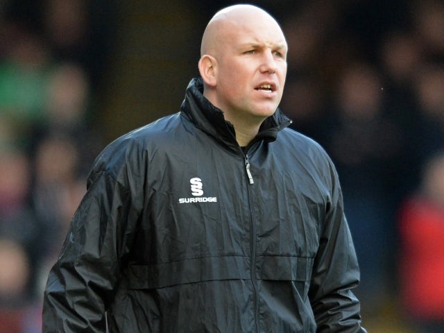 allenatore del Sutton United Matt Gray come assistente allenatore di Aldershot nel dicembre 2014  